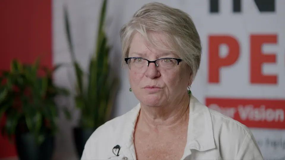 Woman interviewed on camera for the Elder Construction testimonial